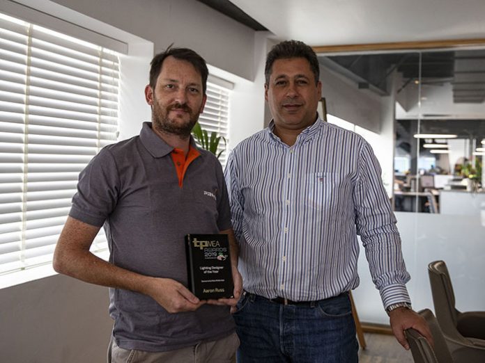 Protec Aaron Russ and Robe Elie Battah pose together with TPMEA Award
